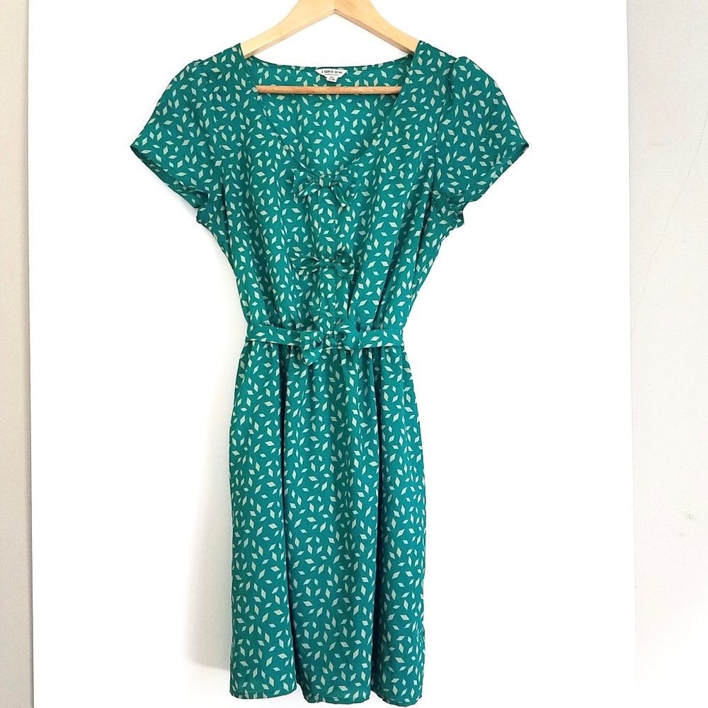 Cute blue-green dress with bows